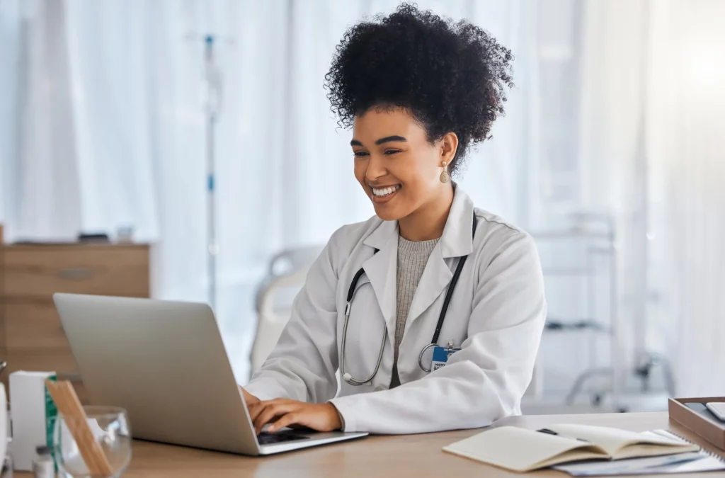 Why Medical Practice Management Software Is Essential for Modern Healthcare Practices 1 Doctorr laptop with smile healthcare
